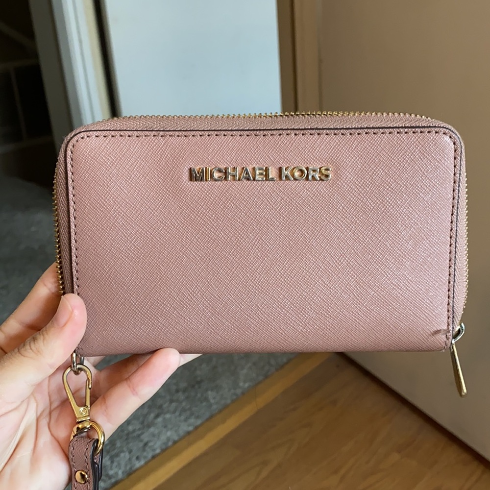 Michael kors wallet.Long strap comes off. like new